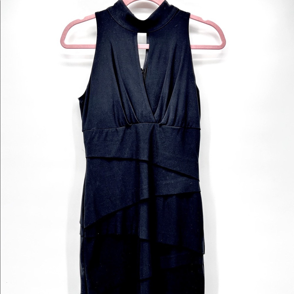 White House Black Market cocktail dress. Fitted in black, size 6.